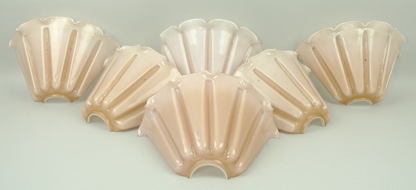 A set of six Art Deco pink glass up-ligh