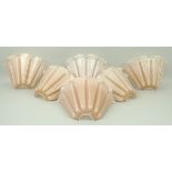 A set of six Art Deco pink glass up-ligh