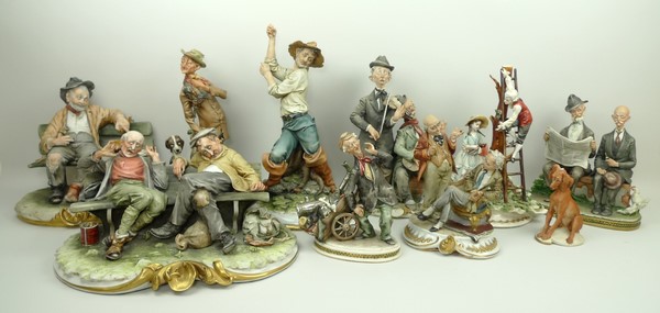 A quantity of Capodimonte porcelain figu