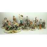 A quantity of Capodimonte porcelain figu