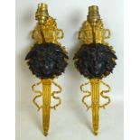 A pair of French gilded sconces, bronze