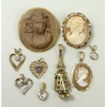 A quantity of 9ct gold pendants comprisi