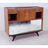 A 1950's cocktail cabinet with splayed l