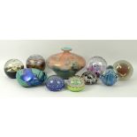 A quantity of glass paperweights, compri