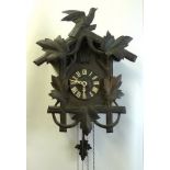 A Black Forest cuckoo clock of conventio