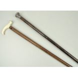 A Victorian malacca cane with an ivory t