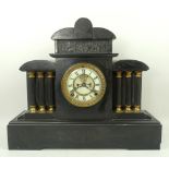 A Victorian slate mantel clock of archit