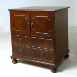 A 19th century mahogany commode, the two