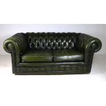 A modern Chesterfield two seater settee,