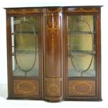An Edwardian glass cabinet, the bulge fr