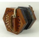 A Lachenal & Co concertina with pierced