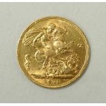 A George V gold sovereign, 1913.