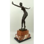 A modern reproduction bronze figure of a