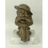 A bronze Bruce Bairnsfather car mascot m