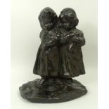 A 19th century bronze figure of two chil