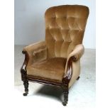 A Victorian button back library chair, w