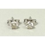 A pair of 14ct white gold and diamond so
