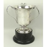 An Art Deco silver three handled cup, Ge