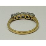 An 18ct gold and diamond five stone ring