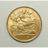 A George V half sovereign, 1909.