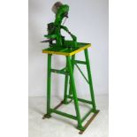 A Schaeffer Levi Jeans riveter machine,