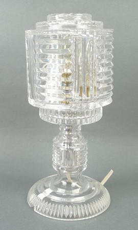 An Art Deco cut glass table lamp and sha