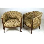 A pair of Edwardian tub chairs with tape