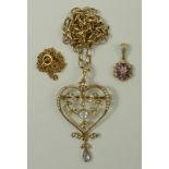 A 9ct gold pendant set with seed pearls and aquamarines, and a 9ct gold pendant in the form of a