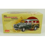 A Sun Star 1:12 scale model of a 1956 Morris Minor 100 Traveller, mint and boxed.