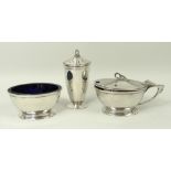A silver three piece condiment set with blue glass liners, Birmingham 1960, 4.15toz.