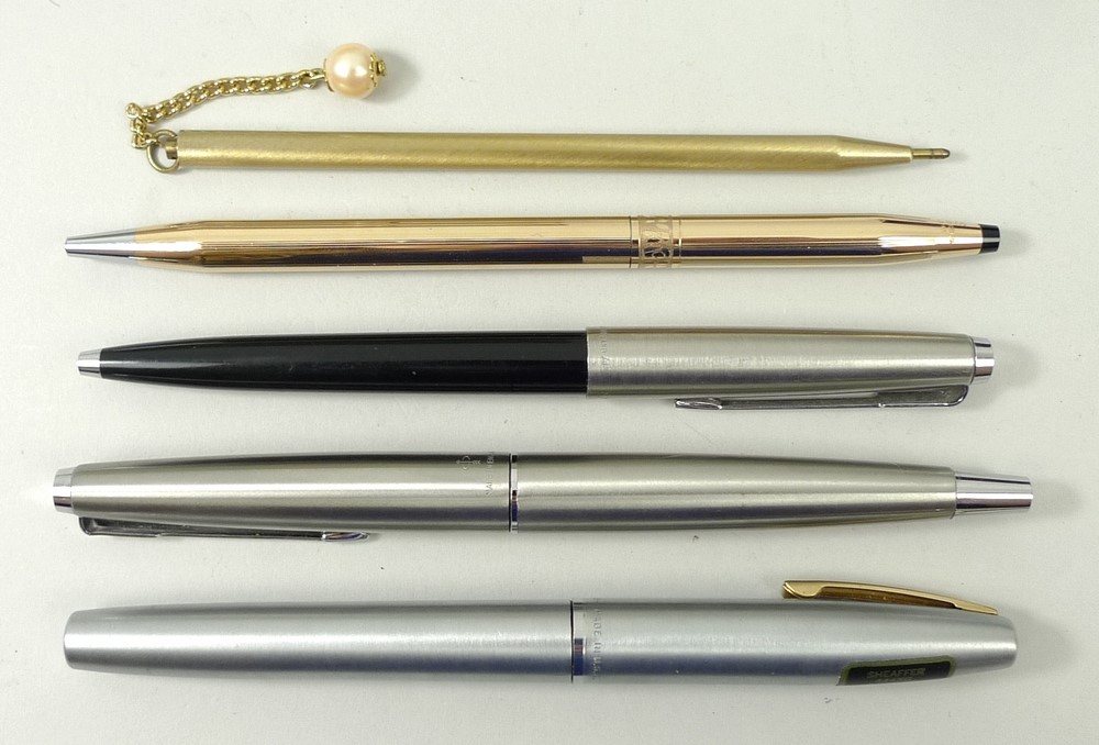 A Sheaffer 444XG medium fountain pen, a stainless steel Parker fountain pen, and a Cross 14kt