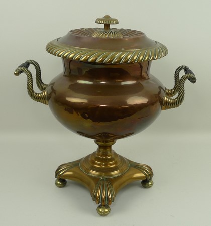 A 19th century copper and brass samovar, raised on a footed base, 40cm. - Image 2 of 2
