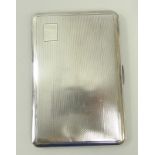 A silver cigarette case with engine turned decoration, Birmingham 1943, 6.9toz.