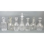 A group of cut glass decanters, 20th century, including one by Baccarat, France, and a near pair of