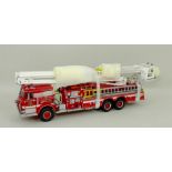 A Franklin Mint model, scale 1:32 of a Pierce Snorkel Fire Truck, mint and boxed.