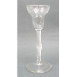 A George II disguised Jacobite wine glass, circa 1755, the pan topped bowl engraved with a