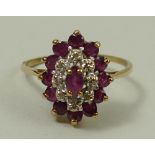 A 9ct gold ruby and diamond cluster ring, size Q, 2.6g.