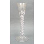 A George III cordial glass, circa 1760, the drawn, trumpet shaped bowl engraved with vines, above a