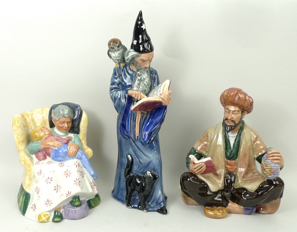 A group of Royal Doulton figures, comprising; 'Omar Khayyam', HN2247, 'Sweet Dreams', HN2380, and