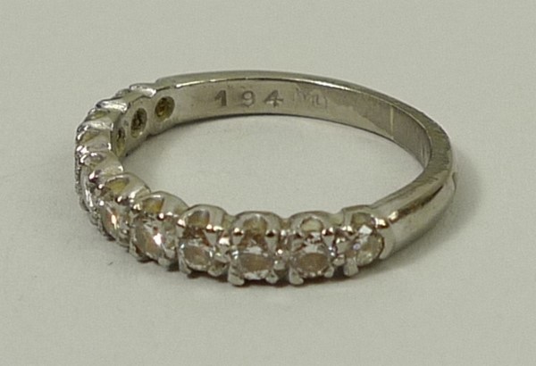 An 18ct white gold and diamond half hoop eternity ring, approximately 0.4ct, size I, 2.8g. - Image 2 of 3