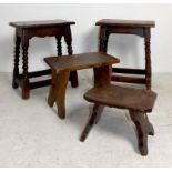 Two oak joint stools in the 17th century style, together with a yew wood milking stool, and a
