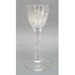 A George III wine glass, circa 1780, the ovoid bowl engraved with a hunting scene, raised on a