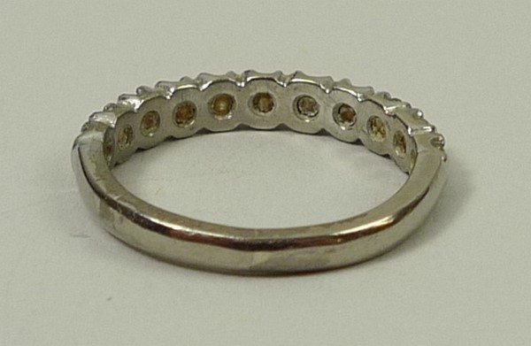 An 18ct white gold and diamond half hoop eternity ring, approximately 0.4ct, size I, 2.8g. - Image 3 of 3