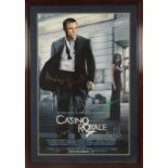 A James Bond Casino Royale poster, signed by the major cast including Daniel Craig, Judi Dench, Eva