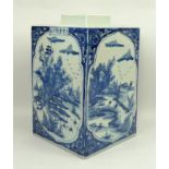 A Chinese porcelain blue and white tea canister of square form, each side decorated with a