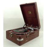 An HMV red cased table top gramophone.