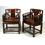 A pair of 19th century Chinese hardwood open armchairs, with burr walnut panels to the pierced back
