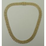 A 9ct gold four strand necklace on a snap clasp, 27.3g.