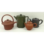 A group of four Chinese Yixing pottery teapots, one green of hexagonal form, inscribed with