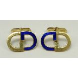 A pair of Gucci 18ct gold and cobalt blue enamel bullet back cufflinks, impressed marks, 15.8g.
